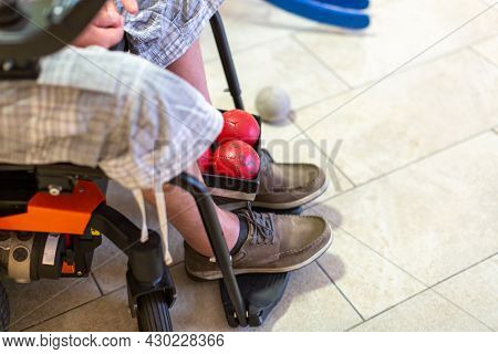 Disabled Boccia Player Playing On A Wheelchair