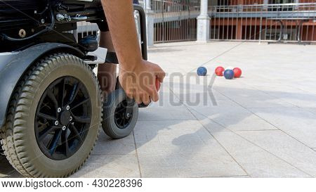 Disabled Boccia Player Playing On A Wheelchair