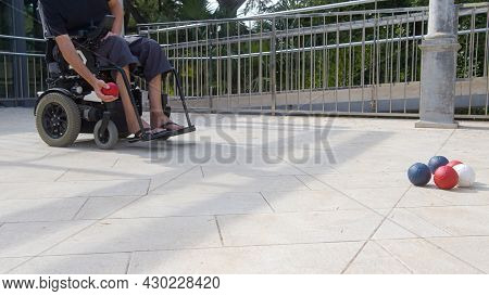 Disabled Boccia Player Playing On A Wheelchair