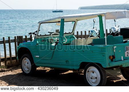 Formentera, Spain: 2021 August 17: Retro Citroen Mehari In Light Blue And White On Mijorn Beach In F