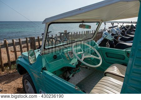 Formentera, Spain: 2021 August 17: Retro Citroen Mehari In Light Blue And White On Mijorn Beach In F
