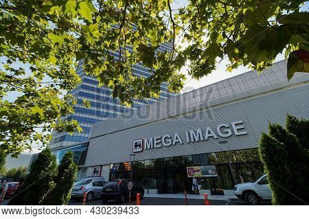 Bucharest, Romania - August 16, 2021: A Patch Of Light Falls On The Front Of The Mega Image Concept 