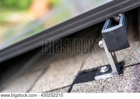 Rail, Bracket, And Anchor To A Solar Panel Installed On A Asphalt Shingle Roof