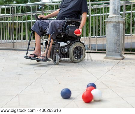 Disabled Boccia Player Playing On A Wheelchair