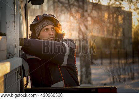 Portrait Of A Hydraulic Crane Operating Worker