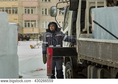 Portrait Of A Hydraulic Crane Operating Worker