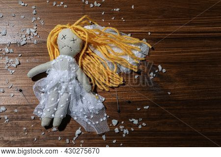 Bride Voodoo Doll With Pins And Salt On Wooden Background, Flat Lay