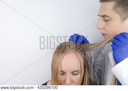 A Trichologist Examines A Girl With Oily Hair. Problematic Scalp And Increased Secretion Of The Seba