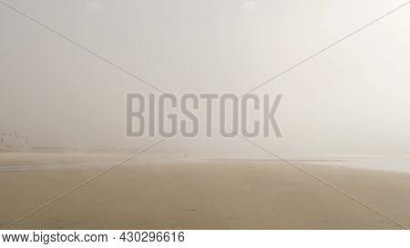 Sandy Misty Beach, Encinitas California Usa. Pacific Ocean Coast, Dense Fog Brume, Empty Sea Shore. 