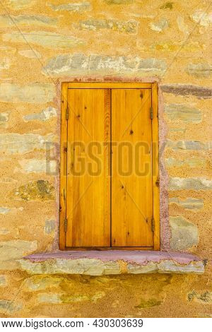 Window Frame Made Of Brown Wood. Old Construction, Ancient Architecture. Enterior Details.