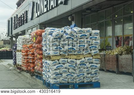 Toronto, Ontario, January 2021 - Stock Of Packed Vegetables On Pallet Just Delivered In Front Of Asi