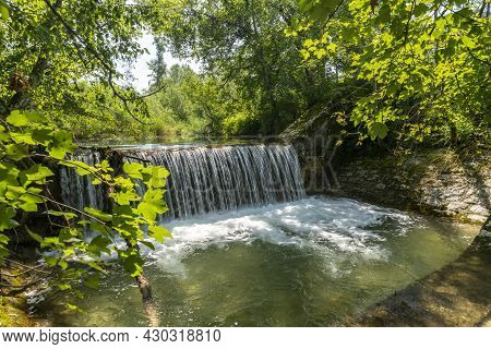 Waterfall At A Barrage In The Forest In The Bavarian Forest Chiemgau Germany