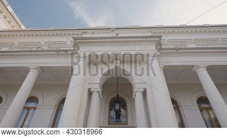 Facade Of Livadia Palace In Crimea. Action. Beautiful Facade Of White Old Building With Columns In E