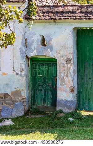 View Of Picturesque Village Viscri In Romania. Painted Traditional Old Houses In Medieval Saxon Vill