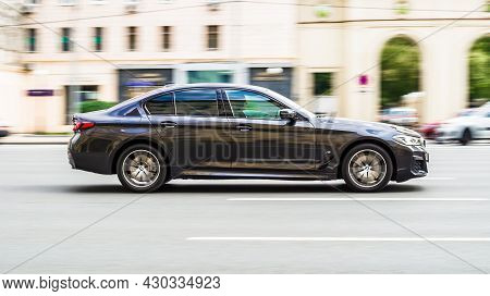 Black Bmw 520d G30 On The City Speedway. Test Driving Bmw 5 Series 2020 Facelift On The Asphalt Road