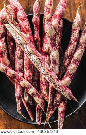 Cranberry beans. Borlotti beans. Beans pods. Top view.