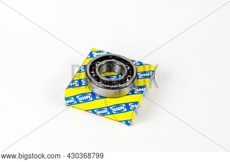 New Ball Bearing And Square Paper Box On White Background. Auto Part Manufactured By Ntn Snr. The Co