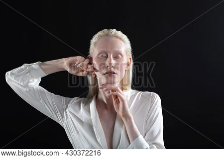 Young Blonde Albino Woman Doing Face Building Facial Gymnastics Self Massage And Rejuvenating Exerci