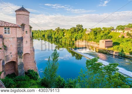 Morning View At The Tarn River With Tower Of Church Of Saint Michel In Gaillac - France