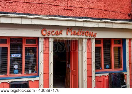 Kinsale, Ireland- July 13, 2021: The Sign For Oscar Madisons  In Kinsale