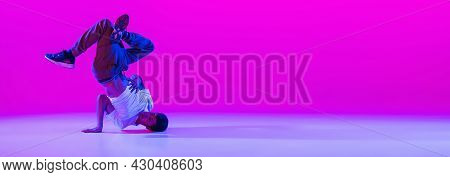 Flyer With Dancing Man, Break Dancer In Action, Motion In Modern Clothes Isolated Over Bright Magent