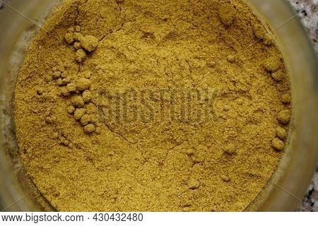 Powdered Cummin Spice In The Jar Close Up View