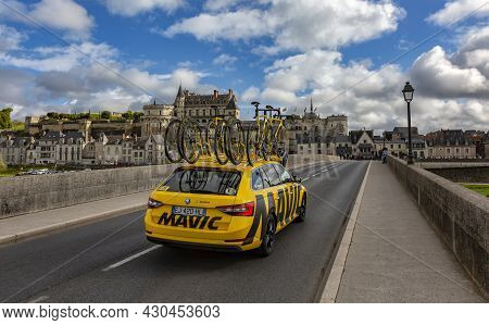 Amboise,france - October 8,2017: The Yellow Service Car Of Mavic Driving On The Bridge In Front Of A