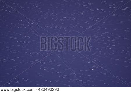 Beautiful Stacked Image Of Night Sky With Short Star Trails, Falling Lyrid Meteors, Airplane And Sat