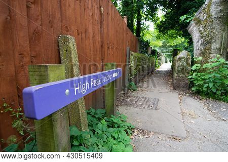 A Purple Sign Post Pointing The Way To High Peak Junction Near Cromford Canal In Derbyshire