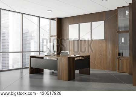 Corner View On Dark Office Room Interior With Three Empty Posters, Panoramic Window With Skyscraper 