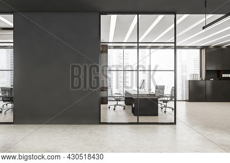 Black Framed Glass Wall Partitions With Accent Grey Details, Led Linear Lights, Concrete Floor And W