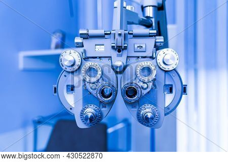Professional Eye Diagnostic Equipment. Ophtalmology Patient Taking Health Care.