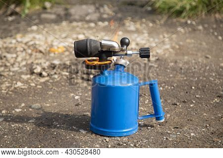 A Gasoline Blowtorch.using A Gasoline Blowtorch For Repairs.
