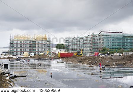 New Housing Development In Progress Building Houses For Increased Demand For Buyers