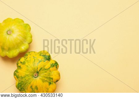 Fresh Ripe Pattypan Squashes On Beige Background, Flat Lay. Space For Text