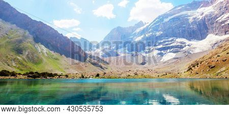 Beautiful serene lake in  Fanns mountains (branch of Pamir) in Tajikistan.