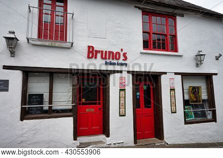 Kinsale, Ireland- July 13, 2021: The Sign For Bruno's Italian  Restaurant  In Kinsale