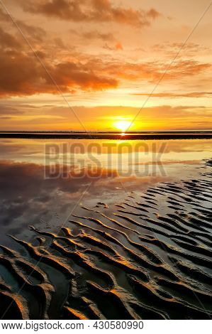 Beautiful Sunset Colors Over The Coastline Of Allerdale District In Cumbria, Uk. Sun Setting Over Th