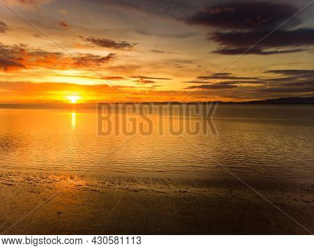 Beautiful Sunset Colors Over The Coastline Of Allerdale District In Cumbria, Uk. Sun Setting Over Th