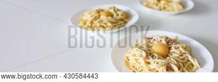 Cooked Dish With Pasta, Egg And Bacon