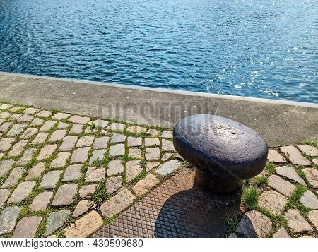 Different Bollards In Front Of The Water At The Port Of Kiel.