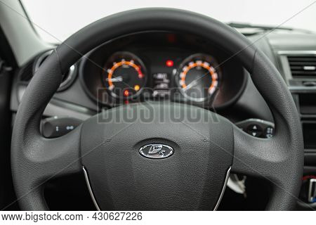 Novosibirsk, Russia - July 21, 2021: Lada Granta, Dashboard,  Steering Wheel With Logo And Buttons, 