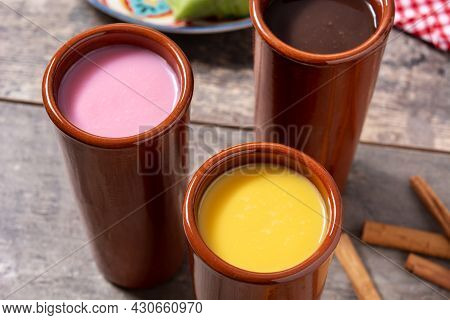 Traditional Mexican Atole Drink On Wooden Table. Close Up