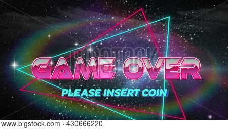 Image of image screen with Game Over Please Insert Coin text written in metallic letters and neon triangles on black background. Vintage image game entertainment concept digitally generated image.