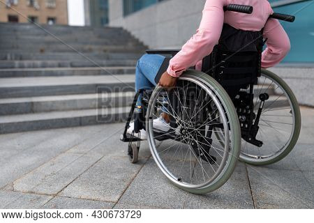 Unrecognizable Young Black Paraplegic Woman In Wheelchair Cannot Go Up Stairs Without Ramp, Feeling 