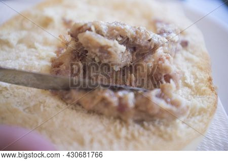 Loin Zurrapa Pate Or Lard With Pork Flakes Been Spreaded By Knife. Selective Focus