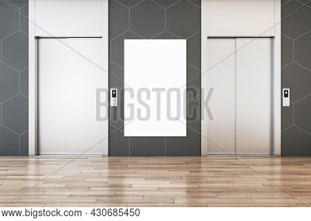 Modern Office Lobby Interior With Steel Elevators, Empty White Mockup Frame, Wooden Flooring And Til