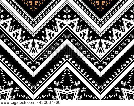 Geometric ethnic pattern seamless design for background or wallpaper. Ikat fabric pattern design con