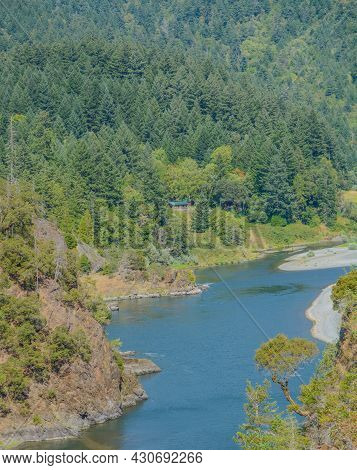 The Rogue River Flowing Through The Siskiyou National Forest In Oregon