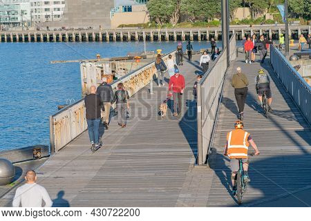 Wellington New Zealand - July 30 2021; People Walking To And Fro Along The Great Harbour Way Also A 